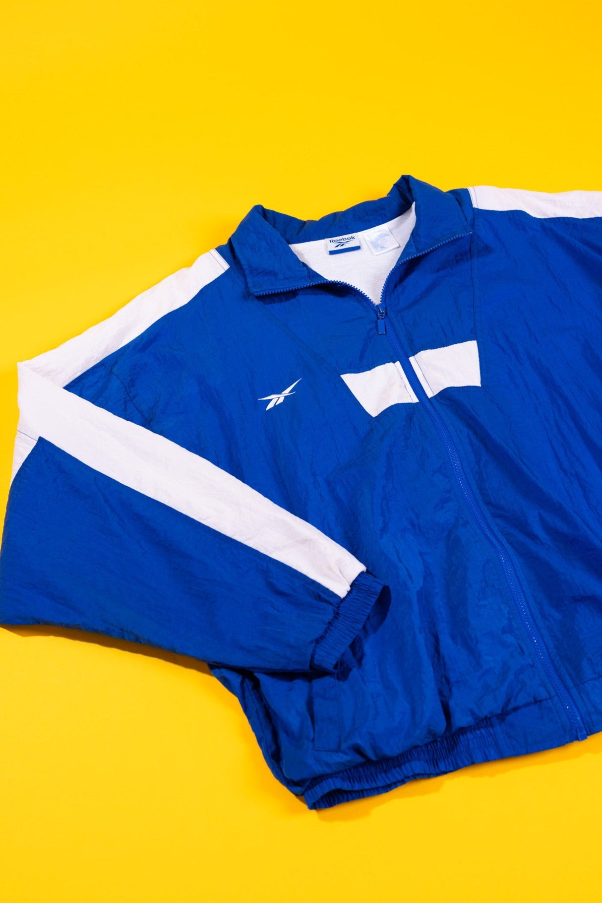 Vintage 90s Reebok Windbreaker (blue/white)