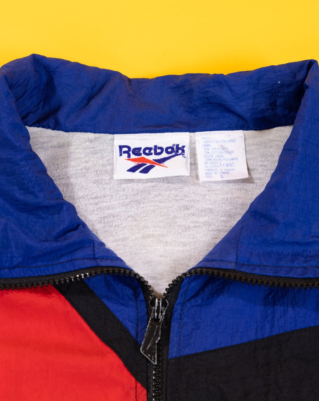 Vintage 90s Reebok Windbreaker (Black/Red/Blue)