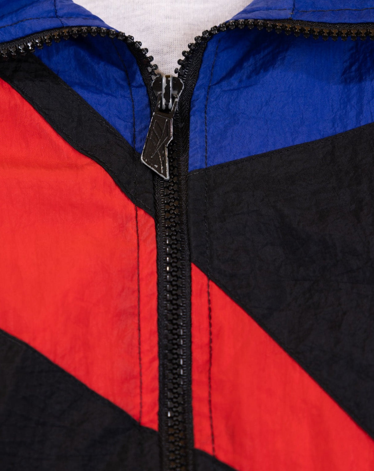 Vintage 90s Reebok Windbreaker (Black/Red/Blue)